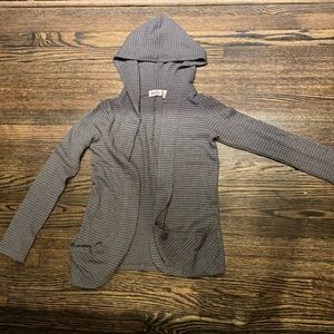 Grey cardigan, soft knit style.